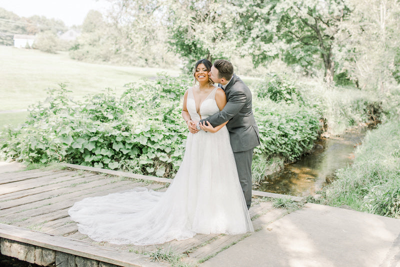 Outdoor Wedding Bride and Groom with Lush Greenery Willow Tree