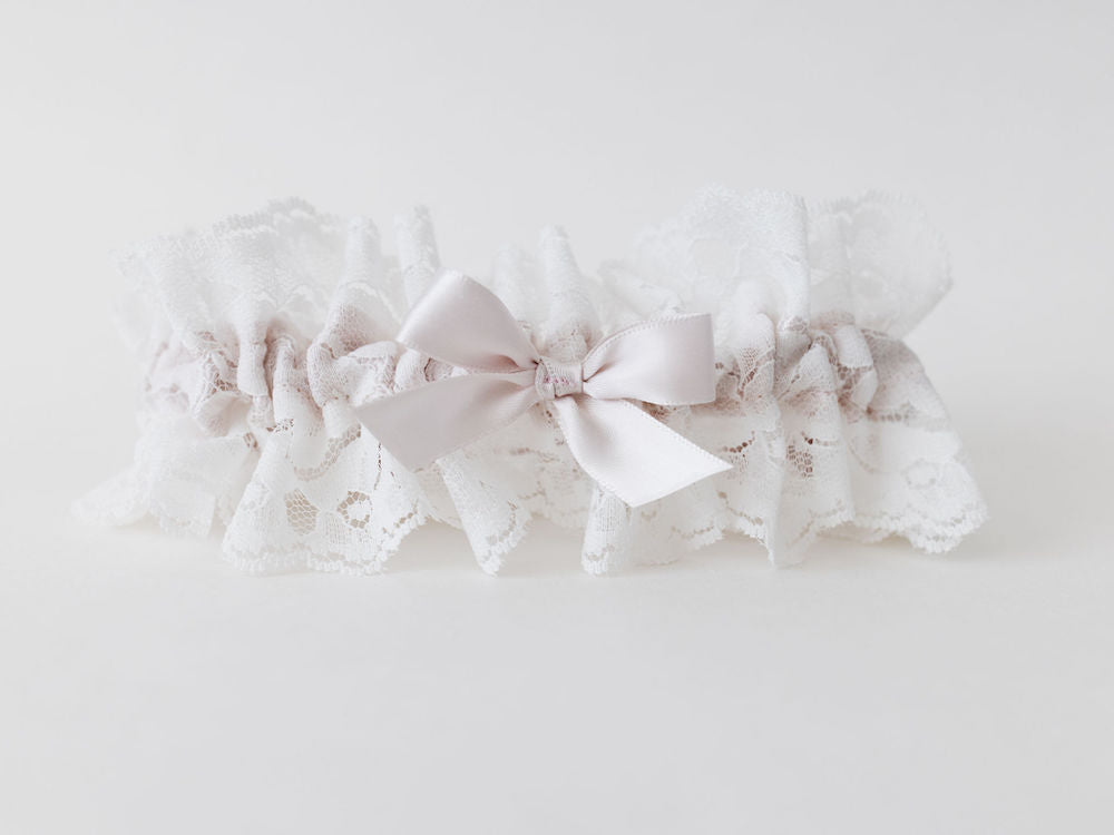 custom wedding garter heirloom with ivory lace and a blush pink satin bow handmade by The Garter Girl