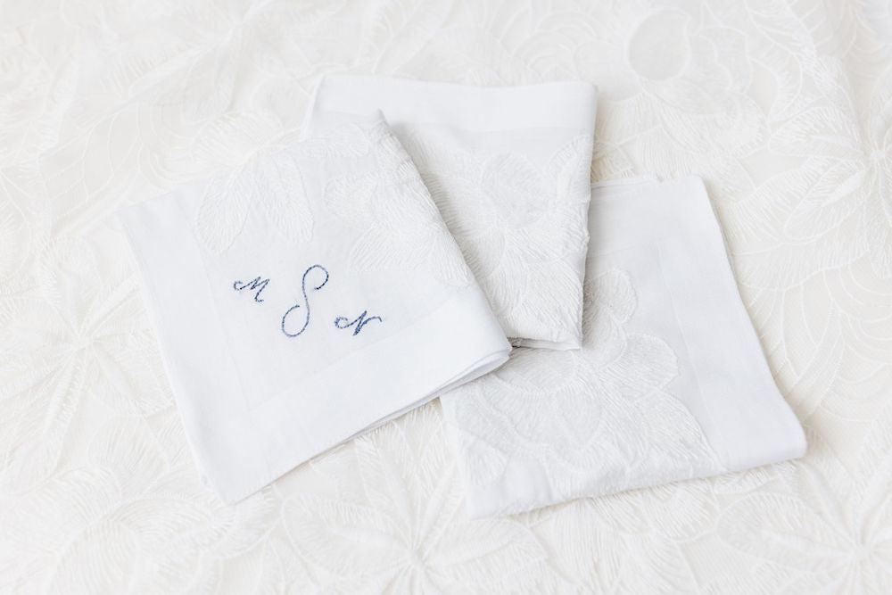three handkerchief heirlooms from grandmother's wedding dress, one with monogrammed embroidery handmade by wedding expert The Garter Girl