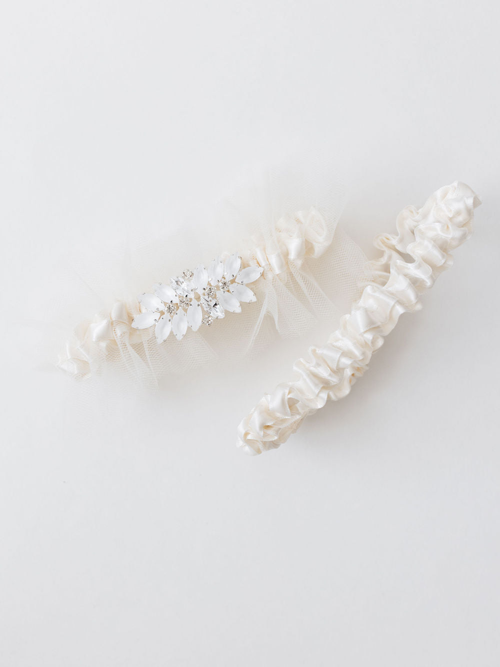 ivory tulle wedding garter heirloom set with main garter sparkle rhinestone detailing and satin ivory tossing garter handmade by The Garter Girl