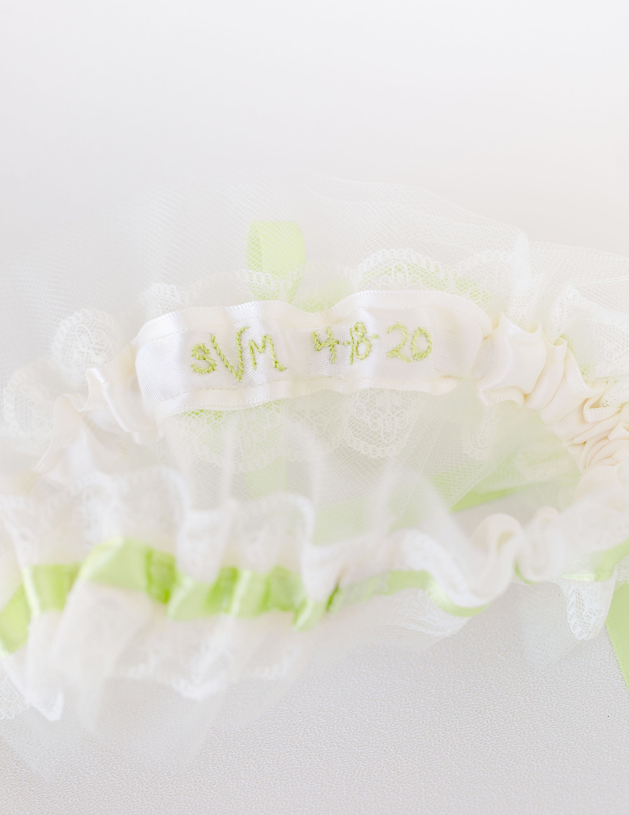 custom wedding garter with pistachio satin, ivory lace & tulle personalized by The Garter Girl