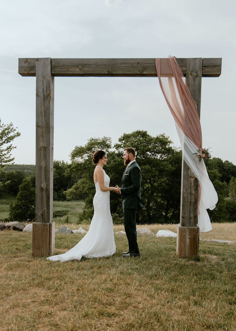 Rustic Barn Wedding Outdoor Ceremony Bride and Groom