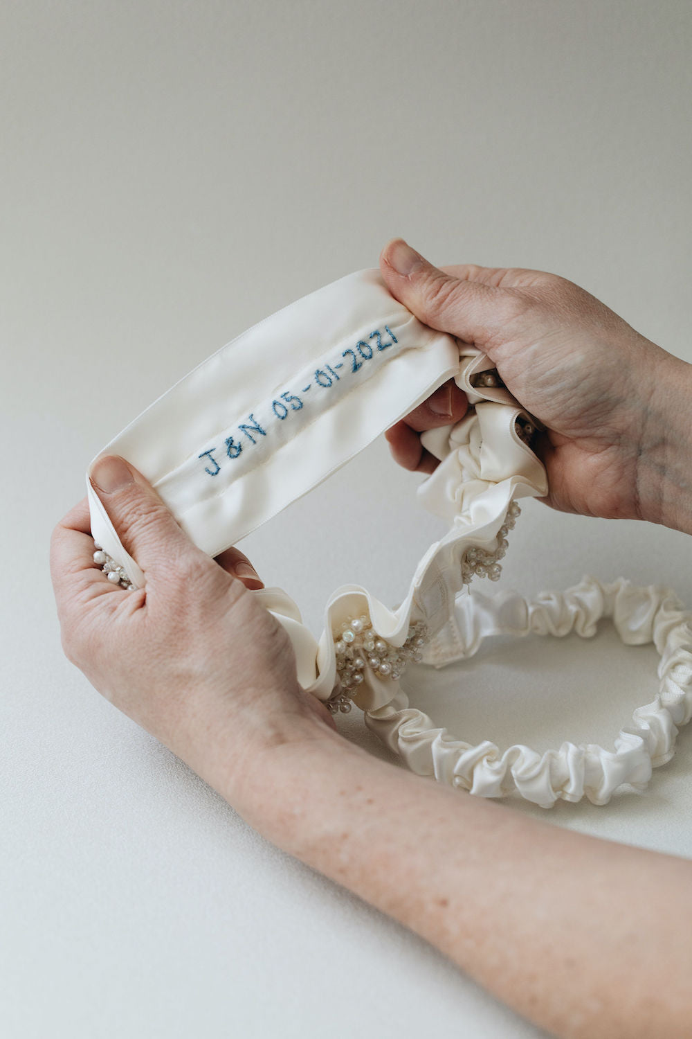 sparkle & satin wedding garter set with personalized something blue embroidery handmade by The Garter Girl