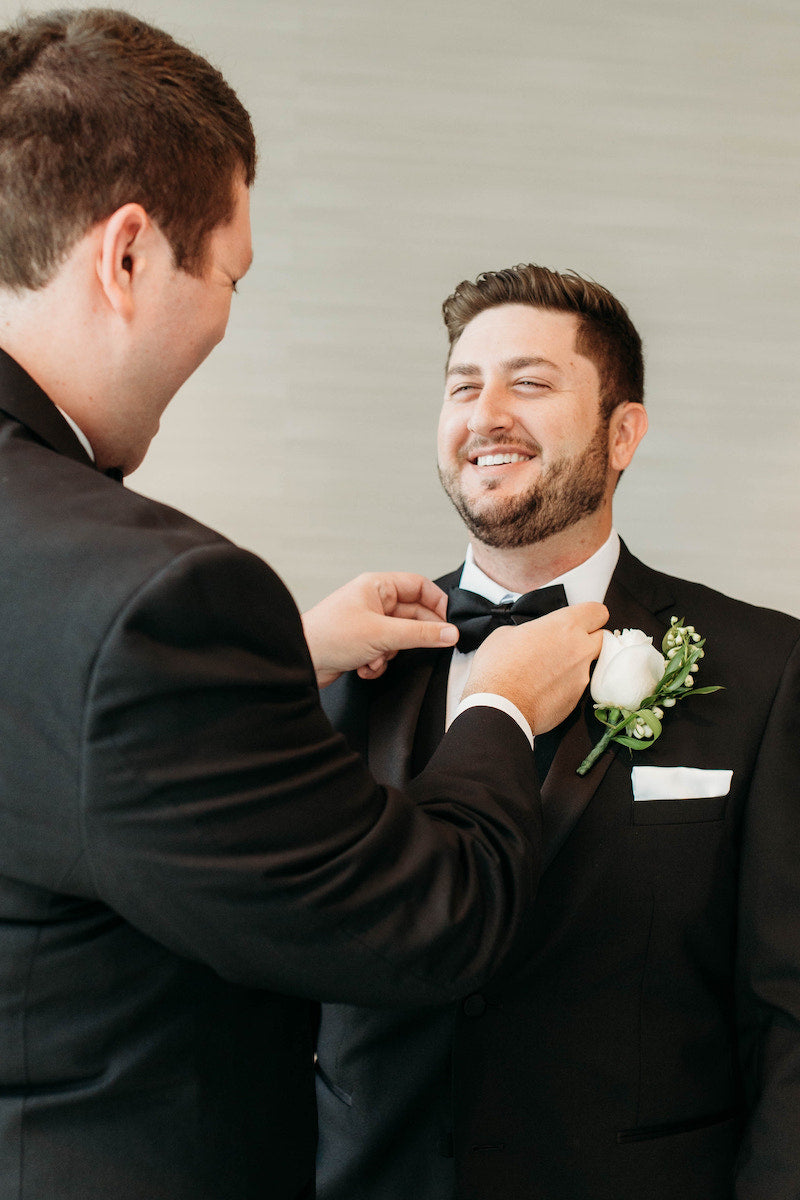 Groom Getting Ready for Elegant Tropical Wedding