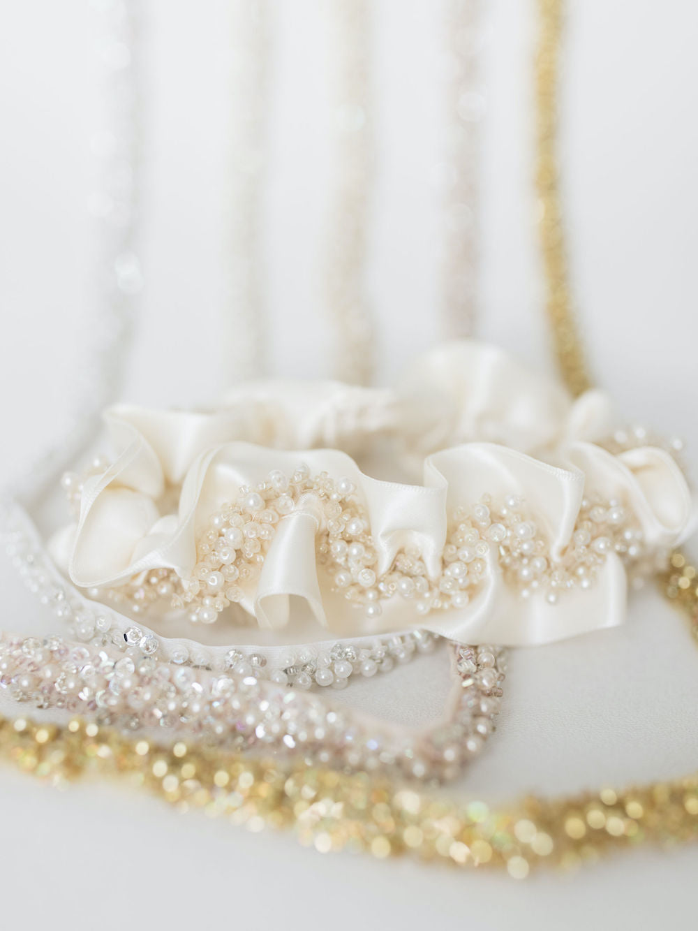 ultimate luxury wedding garter set with sparkles, pearls & beads handmade by expert garter designer The Garter Girl