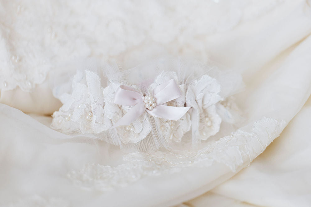 custom wedding garter hand made from the bride's mother's wedding dress with pearls, tulle and lace by The Garter Girl