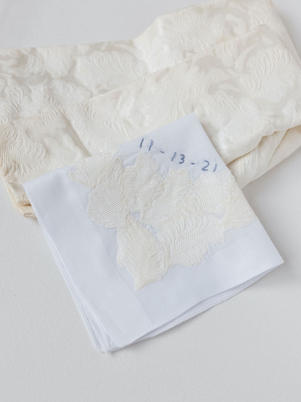 customized wedding handkerchief heirloom handmade with mother's wedding dress sleeves and personalized embroidery by The Garter Girl