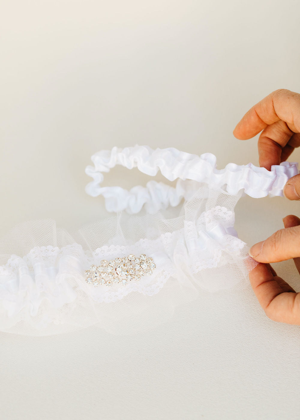 custom wedding garter set with white tulle, sparkle detail, personalized with embroidery by The Garter Girl 