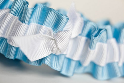 white and blue wedding garter