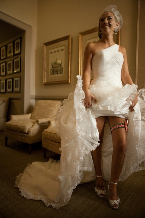 bride-with-pink-gray-wedding-garter