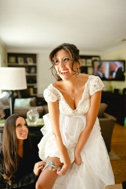 happy-bride-with-wedding-garter-The-Garter-Girl-Kaylee-Casanova-Photography