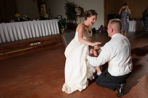 happy-wedding-garter-removal-The-Garter-Girl