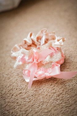 pink-lace-embroidered-wedding-garter-dove-photography