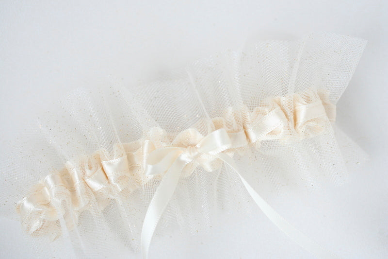 custom bridal garter with ivory tulle gold glitter