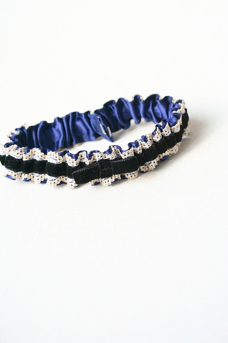 custom black velvet wedding garter with navy blue and gold lace