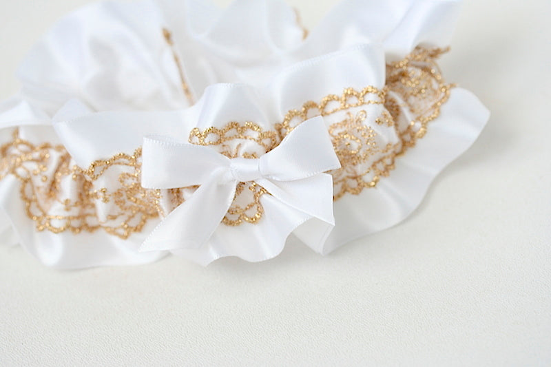 custom garter with white and gold lace