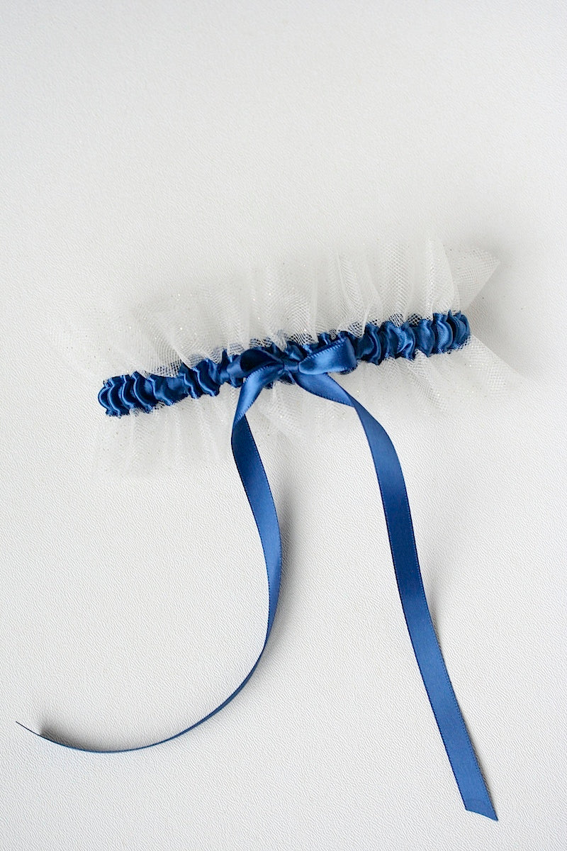 wedding garter with navy blue and gold glitter tulle