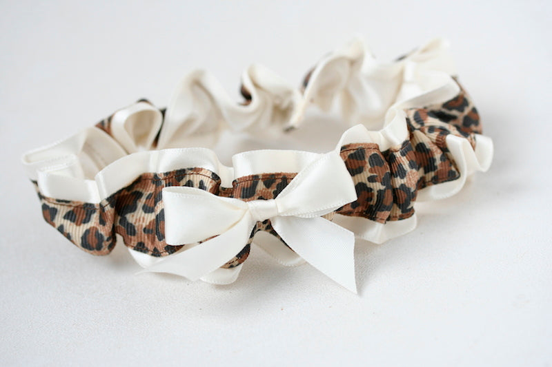 leopard print custom wedding garter with ivory bow