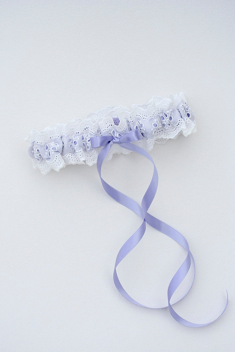 white eyelet lace wedding garter with lilac satin