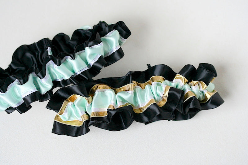 modern wedding garter set with black, white, mint and gold