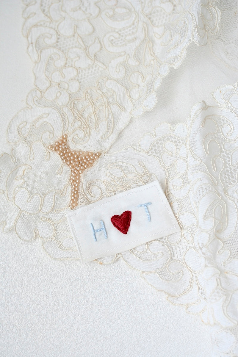 patch for inside of bride's wedding dress made from her mother's dress