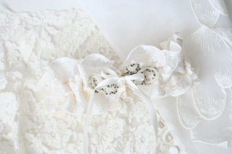 custom wedding garter made from bride's mother's and grandmother's wedding dresses