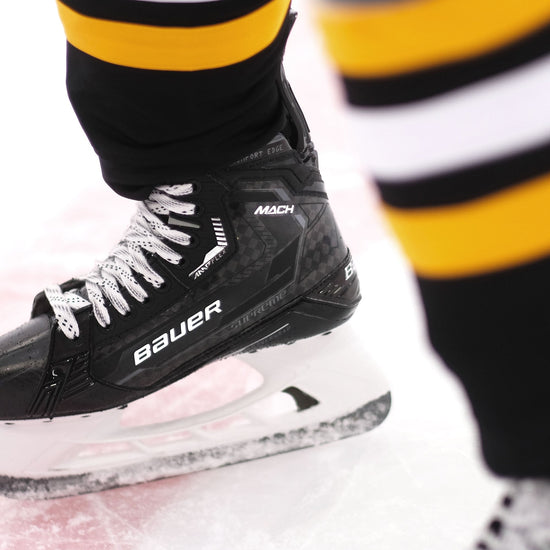 close up of a hockey player's Mach skates