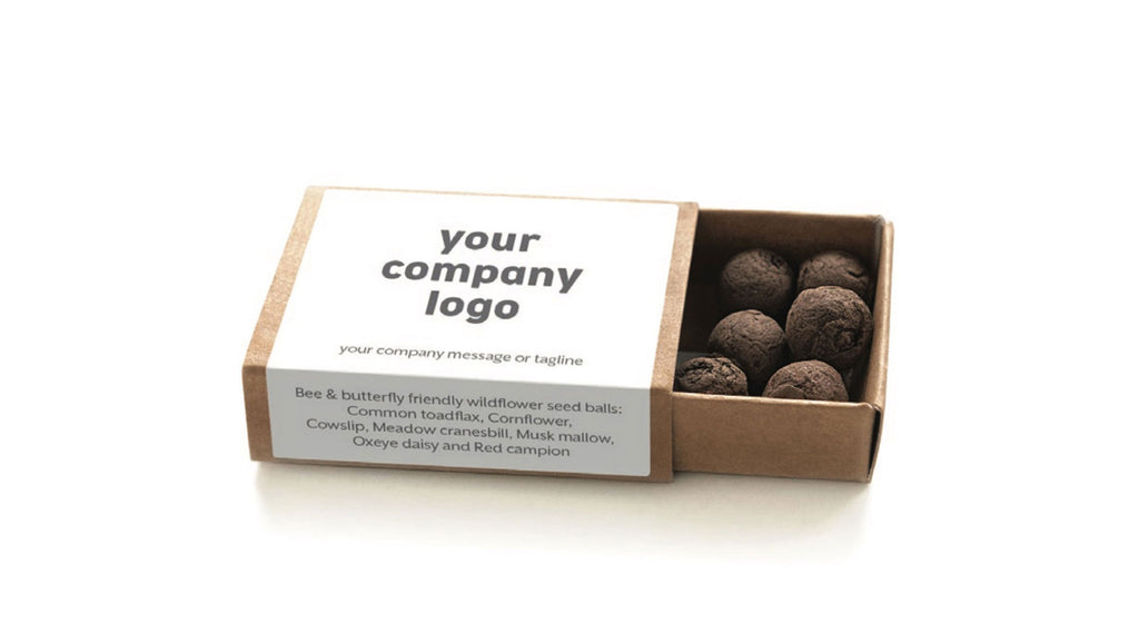 Customisable Seedball Matchbox containing seedballs.  A sustainable example of a corporate giveaway