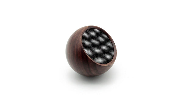 Tumbler Selfie Bluetooth Speaker in a 100% natural and sustainable wood casing plays your favourite tunes and includes a hands-free Selfie function to capture any moment at any time, anywhere