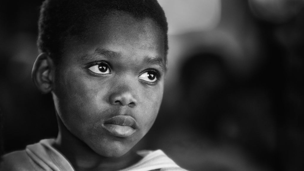 image of a close up of a child's face looking very sad and disillusioned.