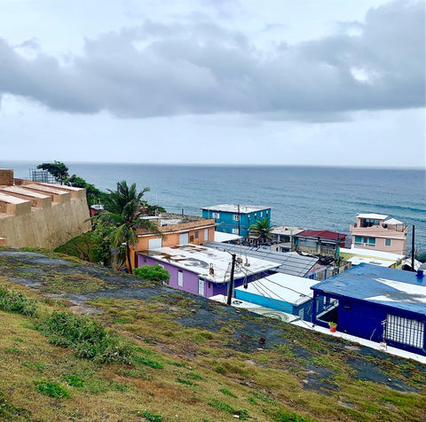 View of colorful houses in Old San Juan, Puerto Rico, overlooking the water