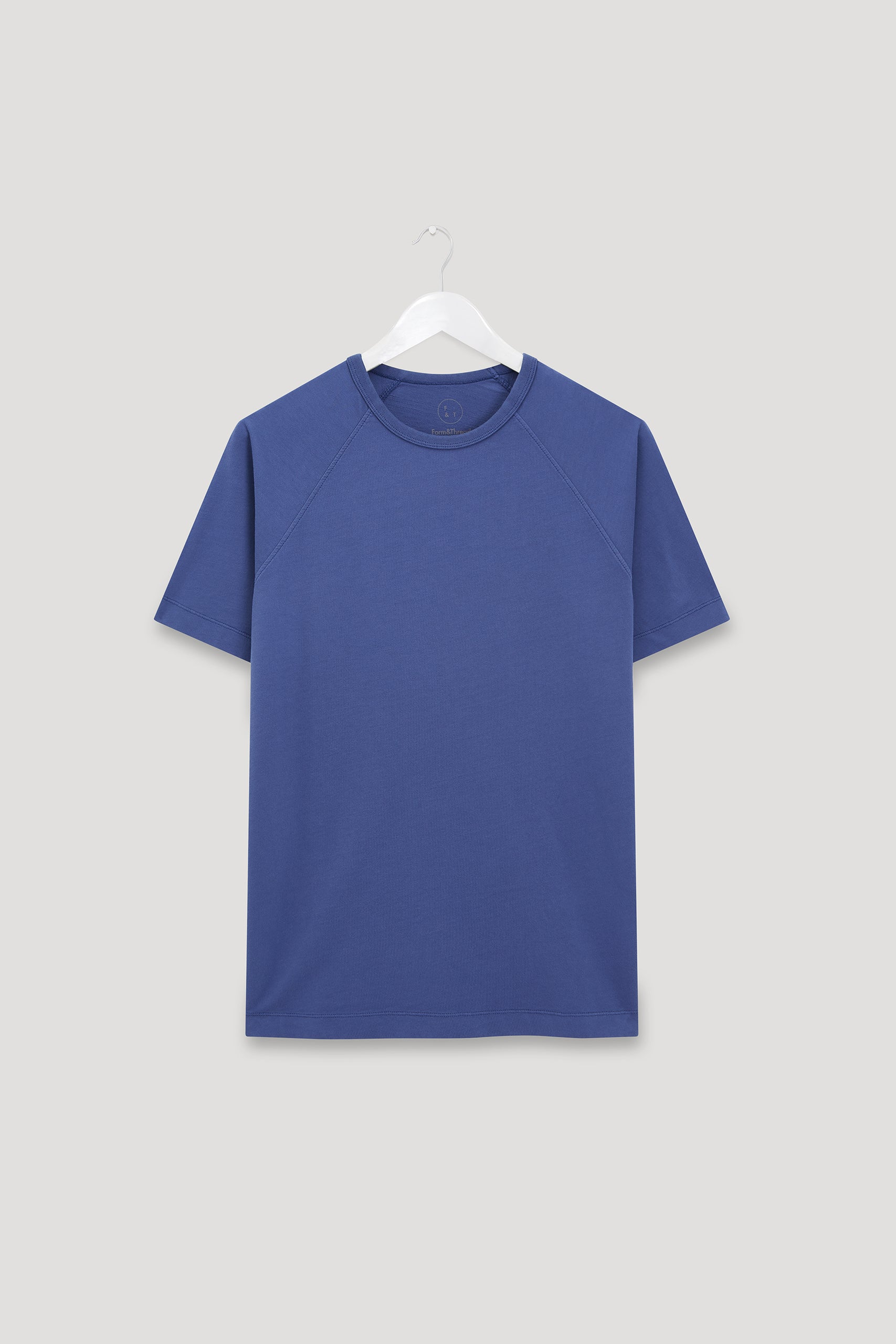 blue and white raglan shirt