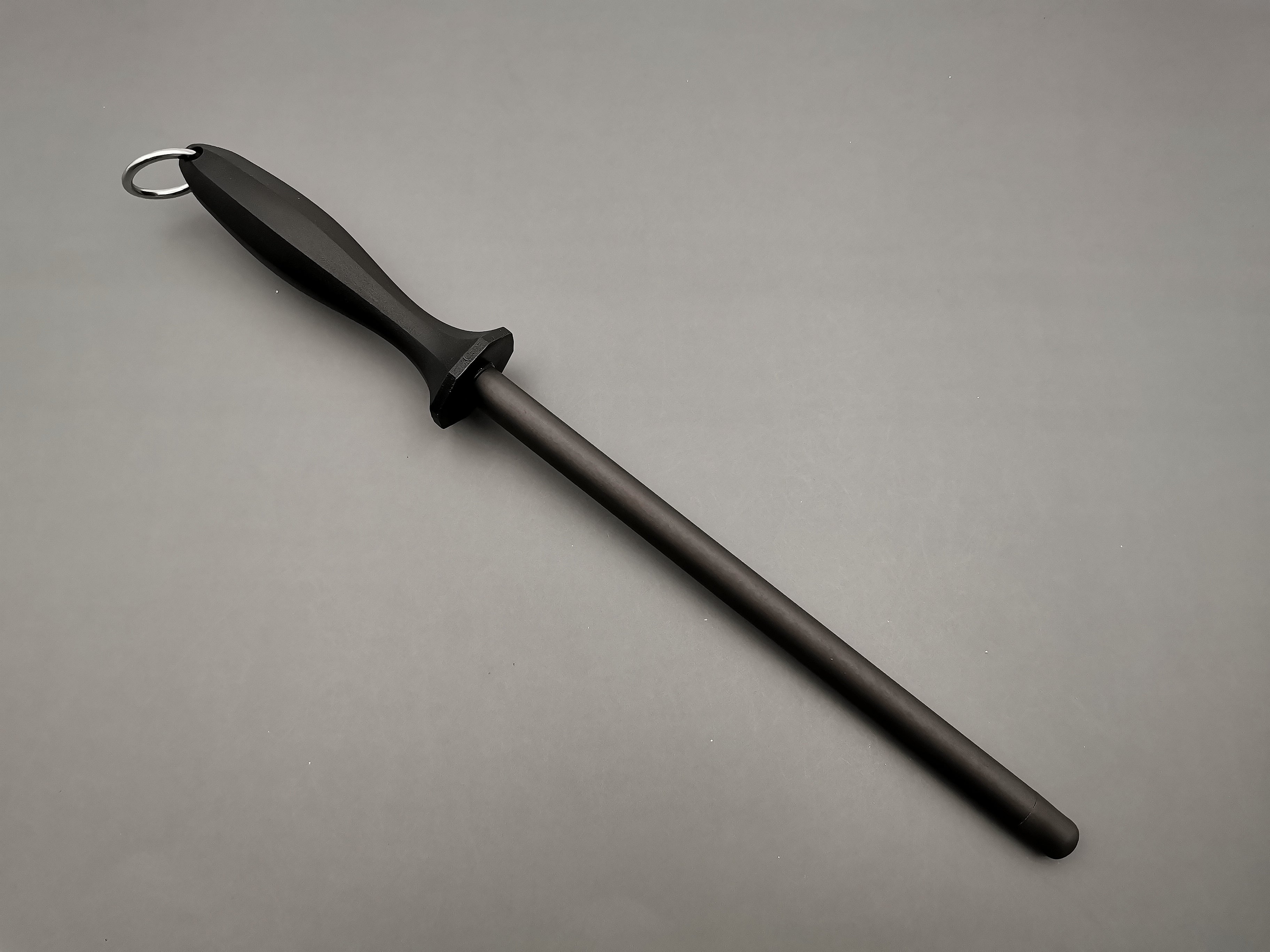 A ceramic honing rod is used to maintain the existing edge of your knife