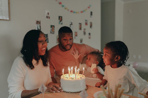 A family celebrating a birthday