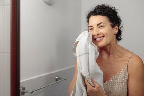 Woman Washing Face Acne
