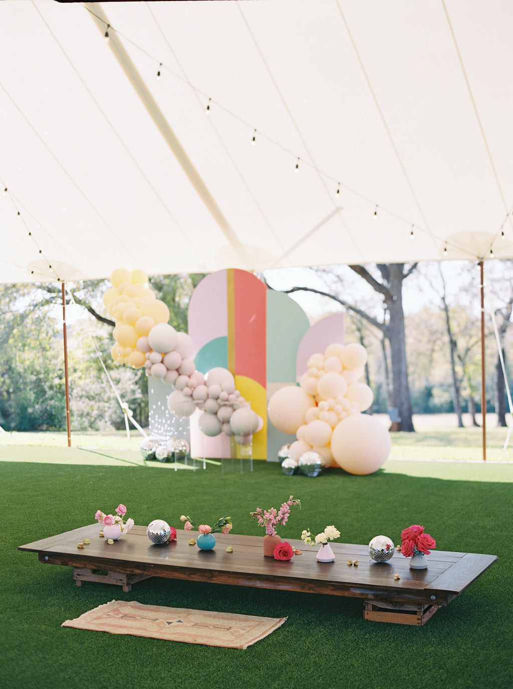 Revelry Goods balloon backdrop for modern bright boho glam kids birthday