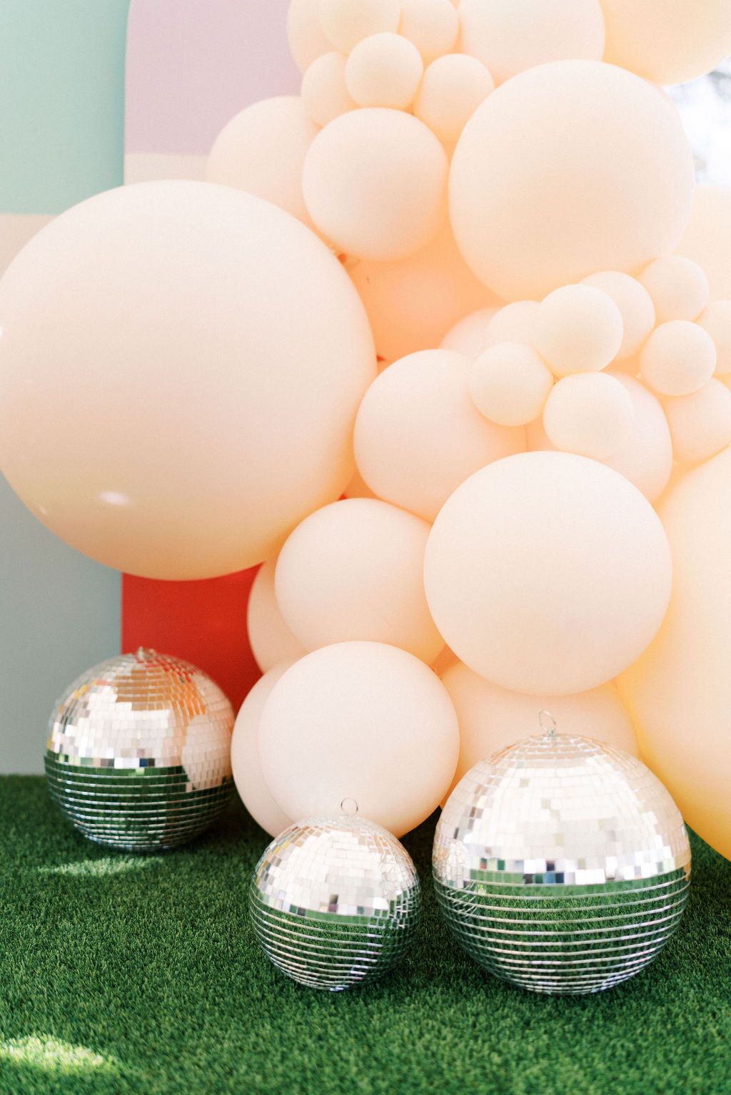 Balloons and discol balls by Revelry Goods in Houston, TX for modern kids birthday celebration