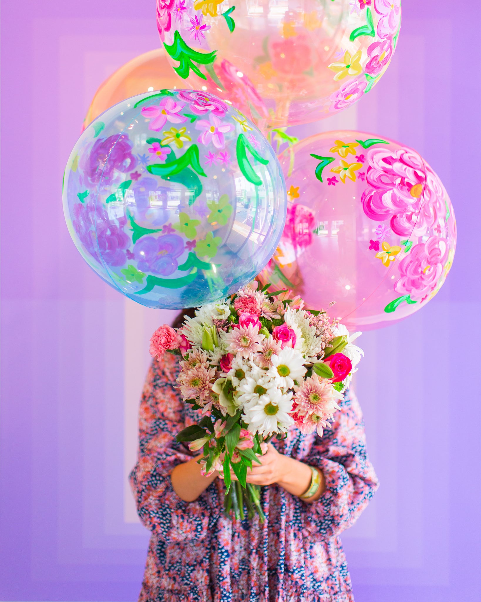 Hand painted floral balloons by Revelry Goods in Houston, TX