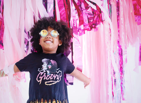 disco party photo shoot by iridescent photography with revelry goods streamer rentals