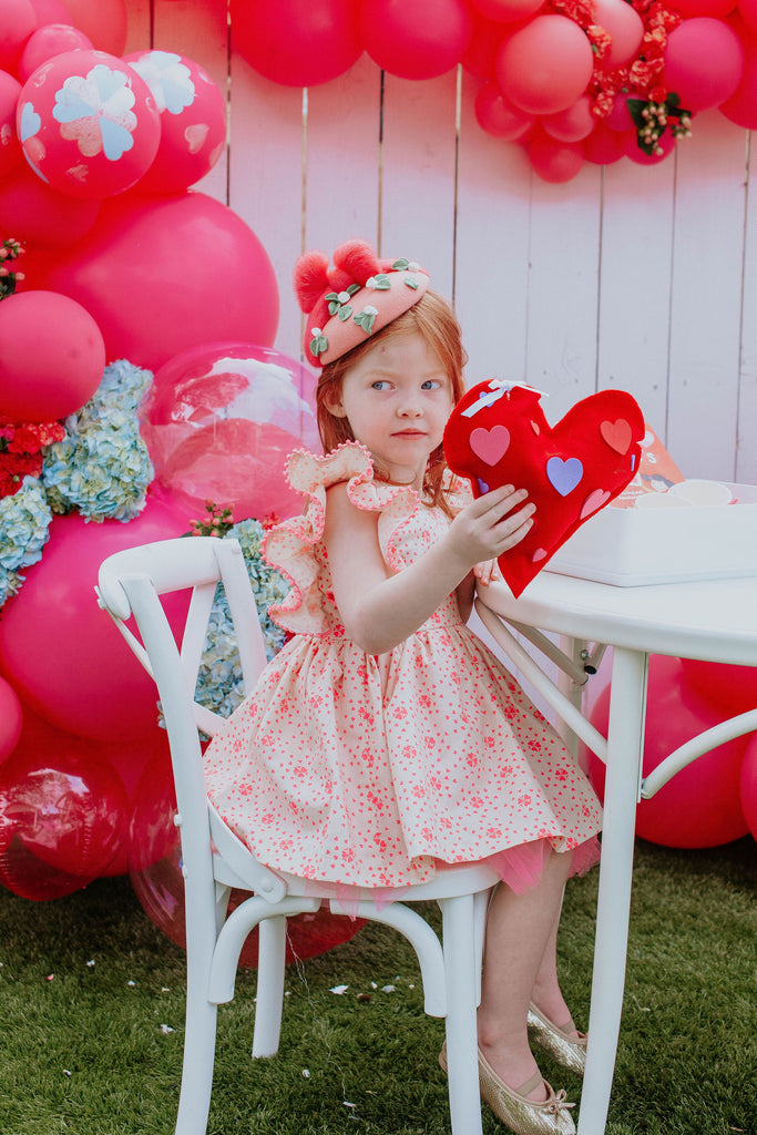 Valentine's photo shoot with Cake and Confetti and balloons by Revelry Goods