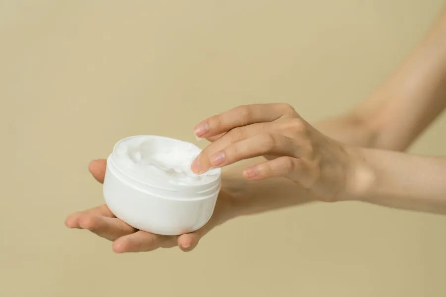 person holding a moisturizer