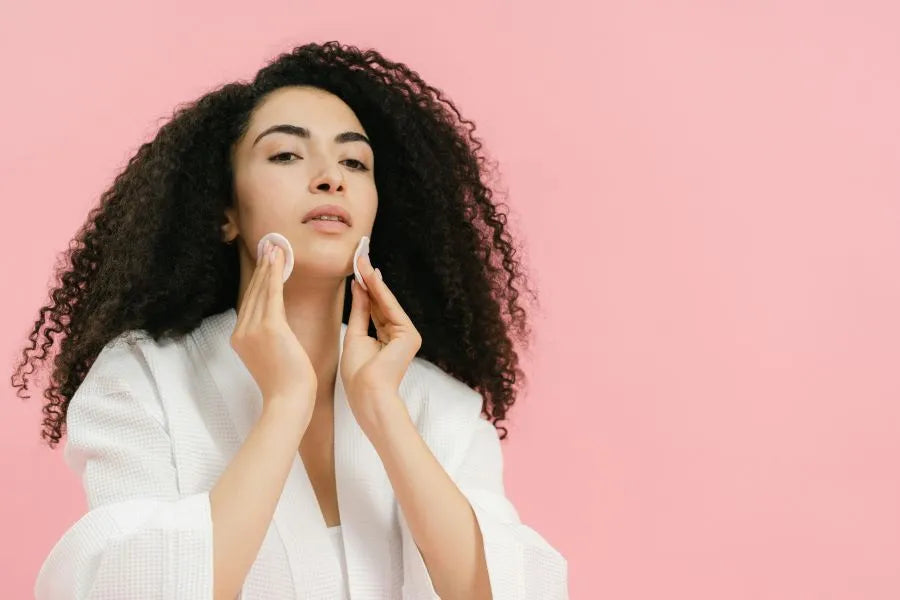 woman removing makeup