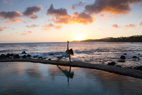 Yoga on the beach at sunset