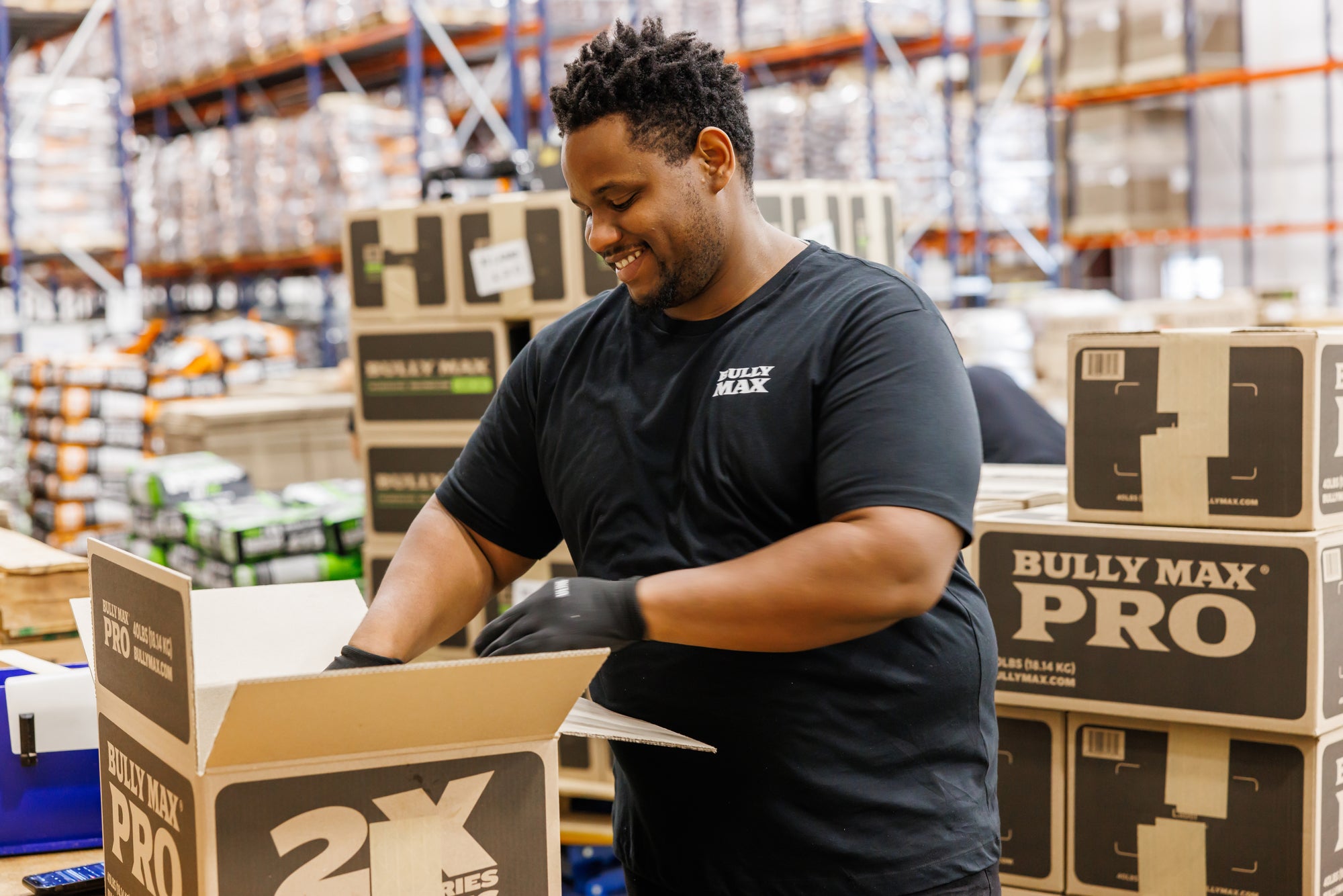 packing high protein dog food orders at a fulfillment center