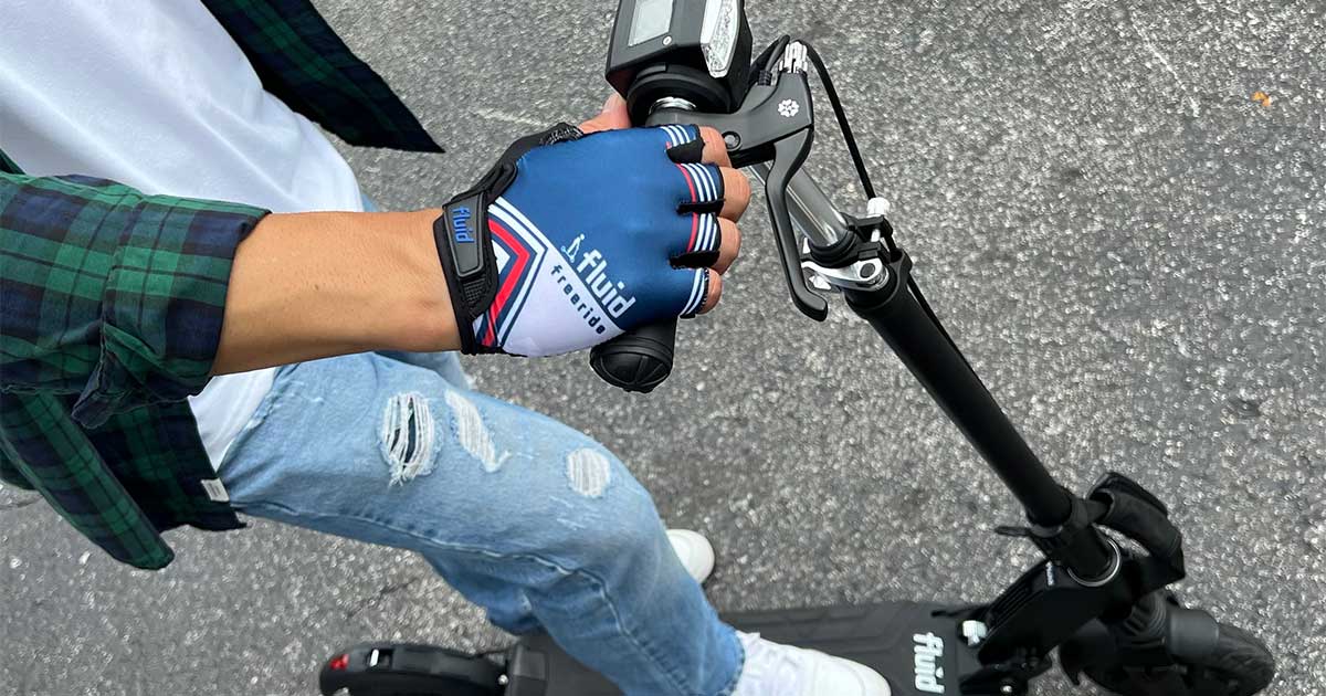 Get a grip on customization with bespoke gloves on a DIY electric scooter's handlebars.