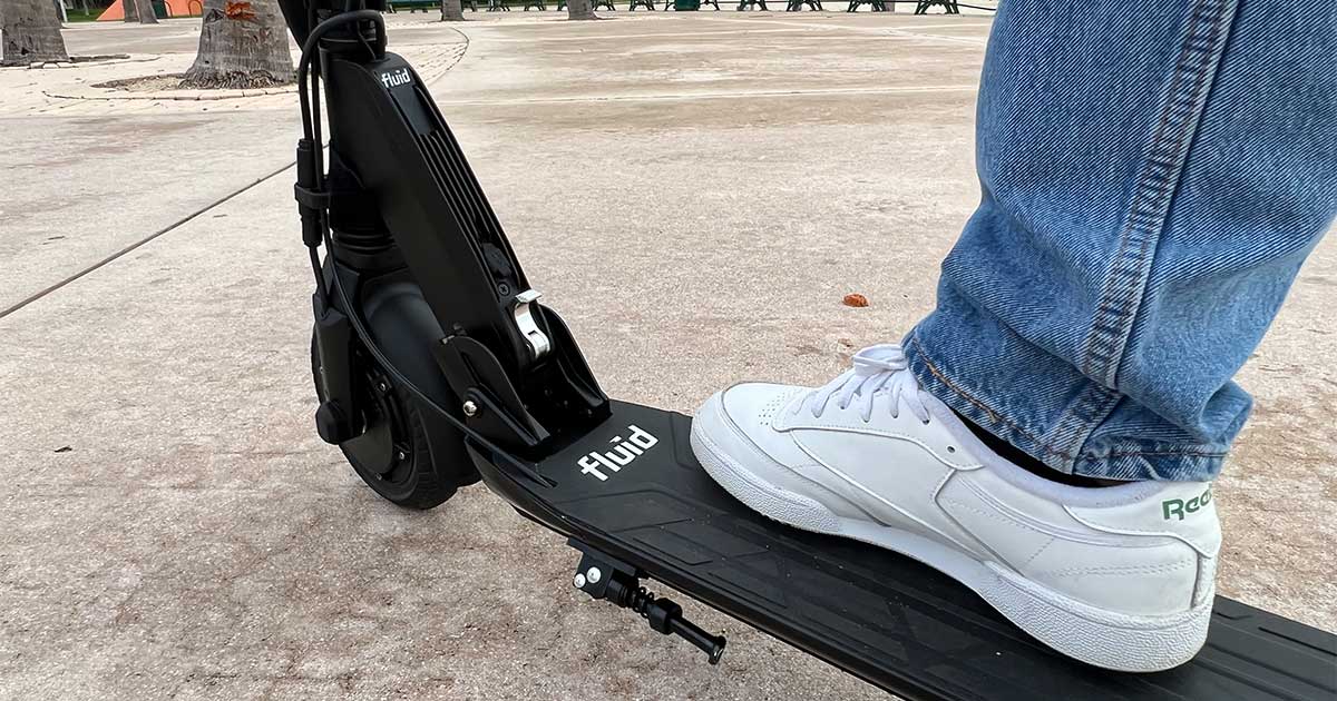 Custom footrest on a DIY electric scooter showcasing performance modifications for a personalized touch.