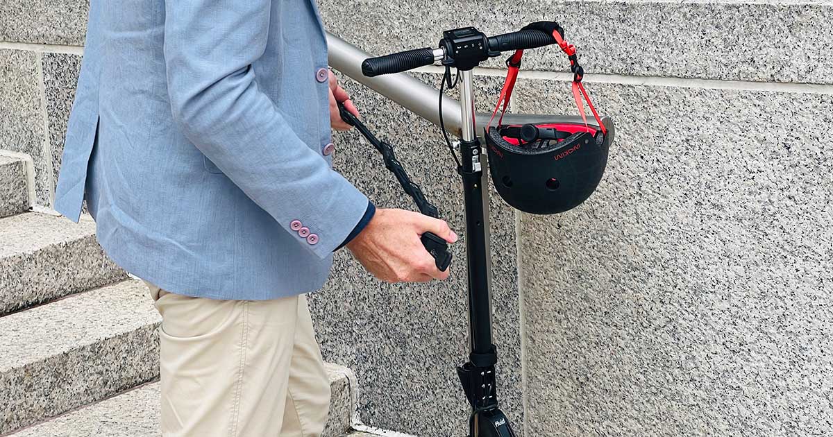 Secure your DIY electric scooter with a personalized locking system, demonstrating safety and creativity