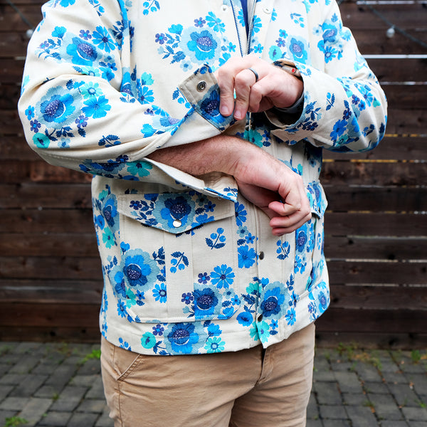 Floral jacket, sleeve cuff open