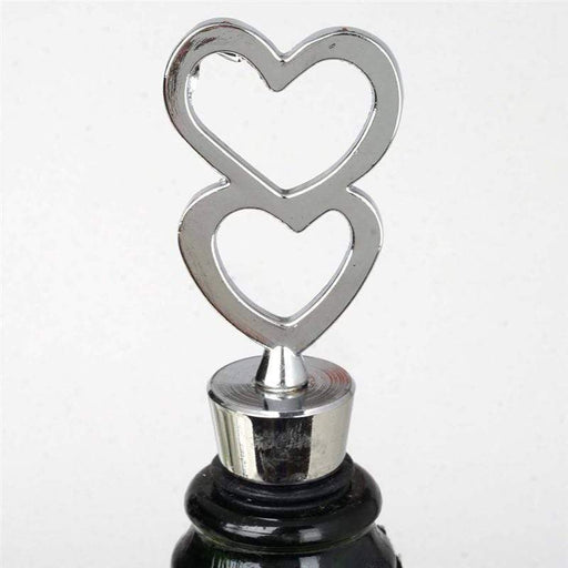 https://cdn.shopify.com/s/files/1/0020/7598/3935/products/two-hearts-wine-bottle-stopper-wedding-favors-28981091729471_512x512.jpg?v=1640142782