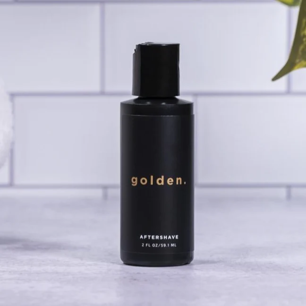 golden grooming aftershave bottle